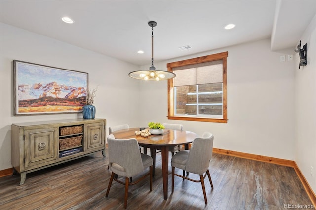 dining room featuring dark wood-type flooring