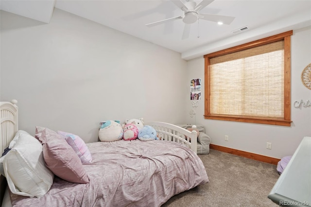 carpeted bedroom with ceiling fan