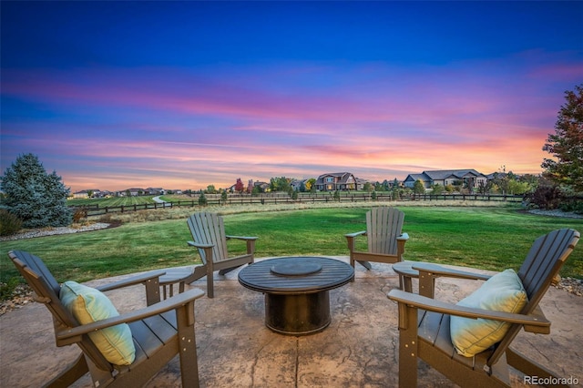 patio terrace at dusk with a lawn