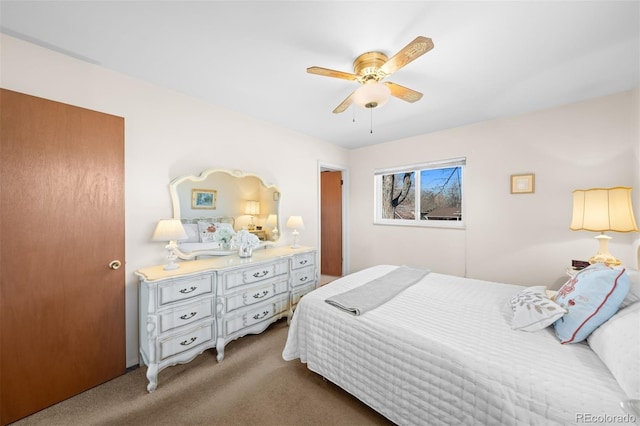 bedroom with carpet and a ceiling fan