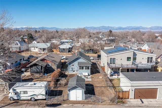 bird's eye view featuring a mountain view and a residential view