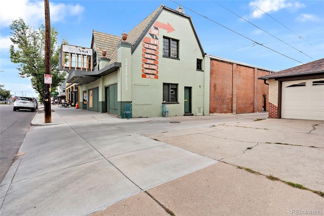 view of building exterior featuring a garage