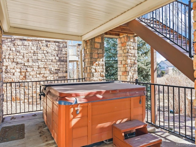 view of patio with a hot tub