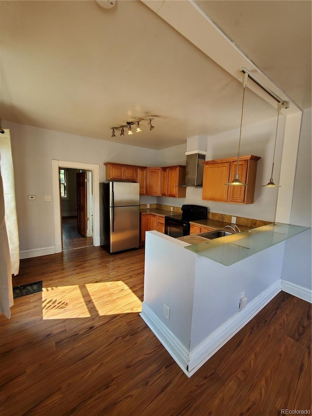 kitchen with kitchen peninsula, stainless steel fridge, dark hardwood / wood-style flooring, and black electric range oven