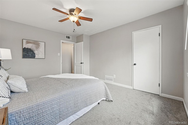 bedroom featuring visible vents, carpet, and baseboards