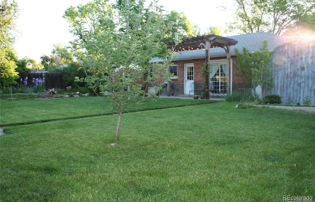 view of yard with a pergola