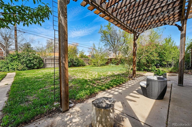 view of patio / terrace with a fenced backyard and a pergola