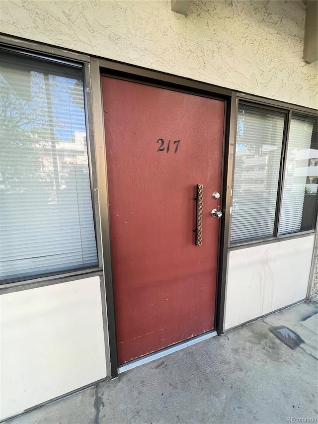 364 S Ironton St Unit 217, Aurora, CO 80012 - entrance to property with stucco siding