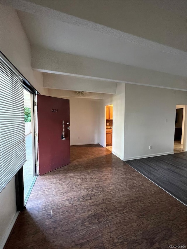364 S Ironton St Unit 217, Aurora, CO 80012 - unfurnished living room with wood finished floors and plenty of natural light