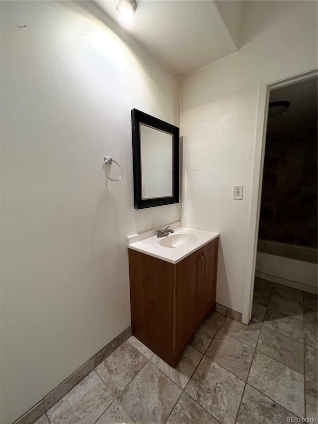 364 S Ironton St Unit 217, Aurora, CO 80012 - bathroom with vanity and marble finish flooring