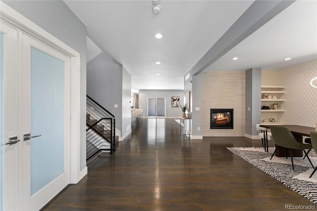 corridor featuring dark wood-type flooring