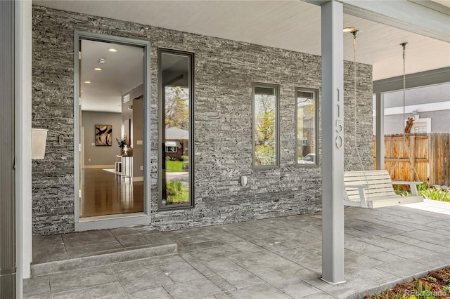 entrance to property with covered porch