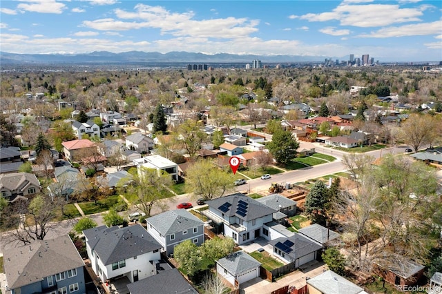 birds eye view of property with a mountain view