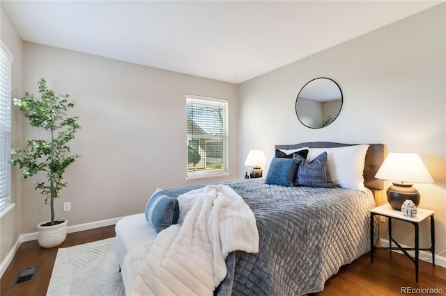 2645 S Xanadu Way Unit D, Aurora, CO 80014 - bedroom featuring wood finished floors