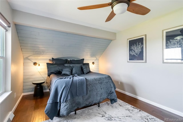 2645 S Xanadu Way Unit D, Aurora, CO 80014 - bedroom featuring multiple windows, wood finished floors, and ceiling fan
