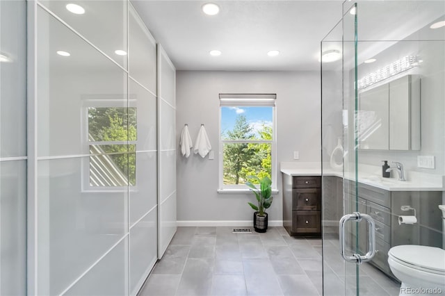 2645 S Xanadu Way Unit D, Aurora, CO 80014 - bathroom featuring vanity, recessed lighting, and tile patterned floors