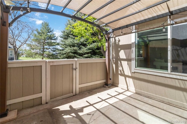 2645 S Xanadu Way Unit D, Aurora, CO 80014 - view of patio featuring a pergola
