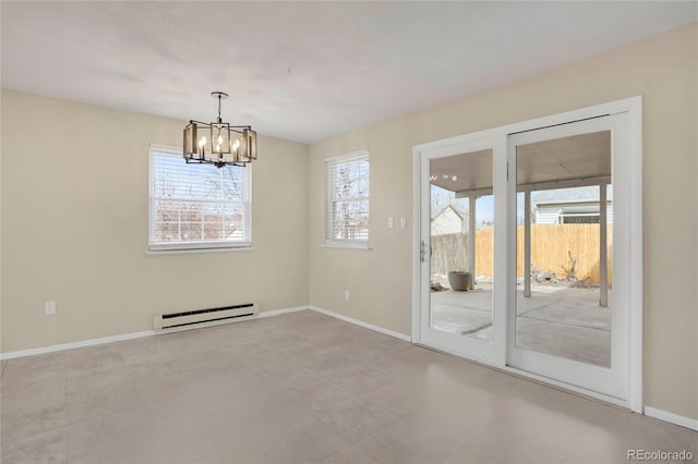 empty room with a baseboard radiator, a chandelier, and baseboards