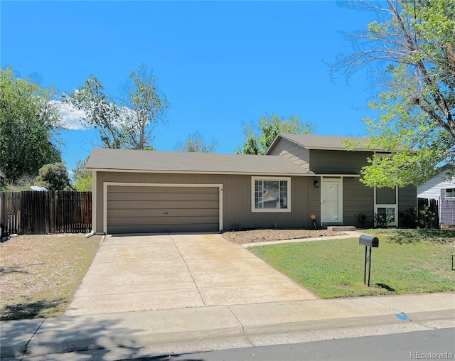 15650 E Eldorado Dr, Aurora, CO 80013 - view of front facade with a garage and driveway