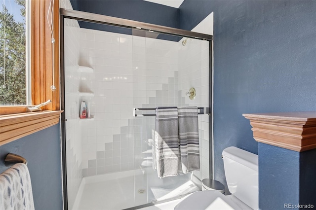 30206 Telluride Ln, Evergreen, CO 80439 - bathroom with a shower stall and a textured wall