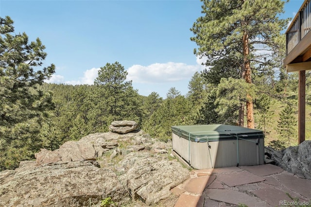 30206 Telluride Ln, Evergreen, CO 80439 - view of yard with a hot tub and a view of trees