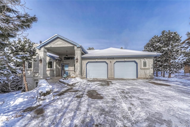 view of front of property with a garage