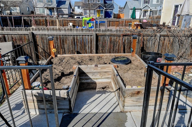 view of yard with a residential view and fence