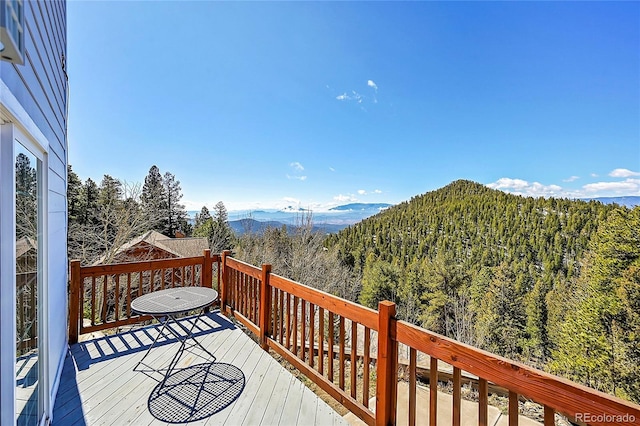 11770 Leavenworth Dr, Conifer, CO 80433 - deck with a forest view and a mountain view