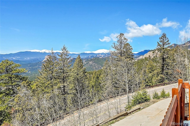 11770 Leavenworth Dr, Conifer, CO 80433 - mountain view featuring a wooded view