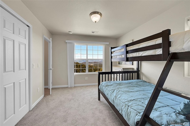11770 Leavenworth Dr, Conifer, CO 80433 - bedroom with baseboards, visible vents, and carpet