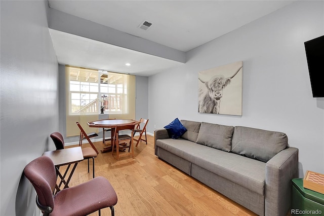 11770 Leavenworth Dr, Conifer, CO 80433 - living area featuring visible vents and light wood-style flooring