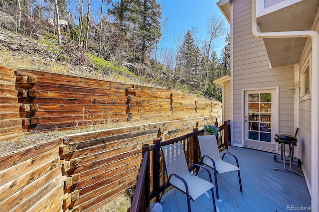 11770 Leavenworth Dr, Conifer, CO 80433 - wooden terrace featuring fence