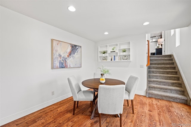 dining area with light hardwood / wood-style flooring