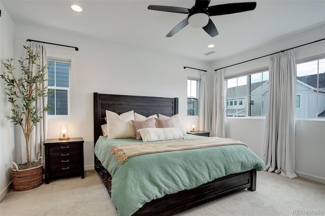 carpeted bedroom featuring ceiling fan