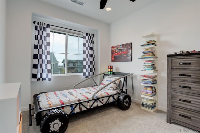 carpeted bedroom featuring ceiling fan