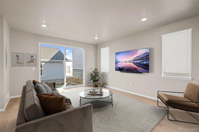 living room with light hardwood / wood-style floors