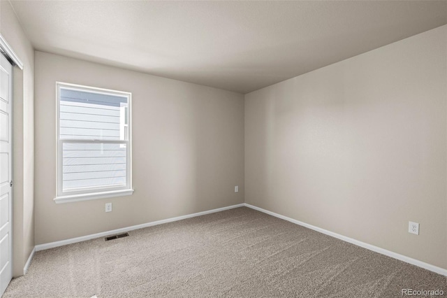 view of carpeted spare room