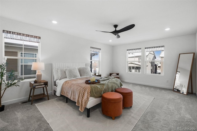 carpeted bedroom with ceiling fan