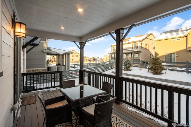 view of snow covered deck