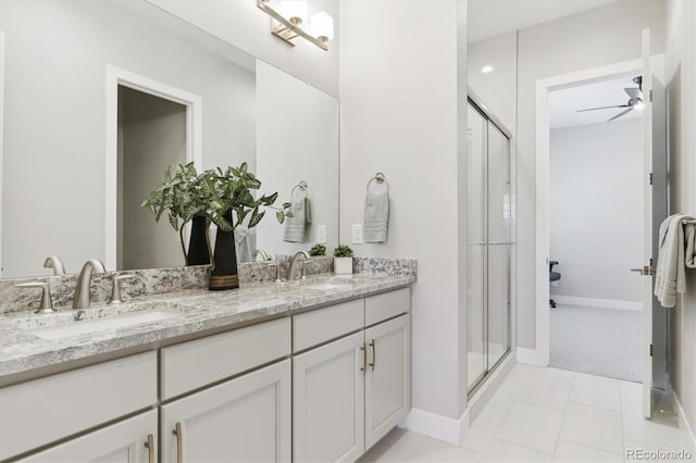 547 Scrubjay Cir, Castle Rock, CO 80104 - bathroom featuring double vanity, a shower stall, and ceiling fan