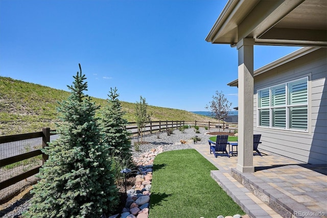 547 Scrubjay Cir, Castle Rock, CO 80104 - fenced backyard featuring a patio area