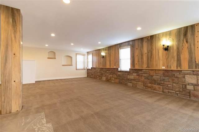 basement with recessed lighting and light colored carpet