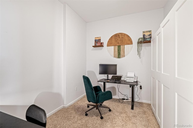 home office featuring light colored carpet