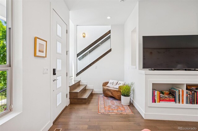 4958 Valentia Ct, Denver, CO 80238 - foyer with stairway, hardwood / wood-style floors, plenty of natural light, baseboards, and recessed lighting