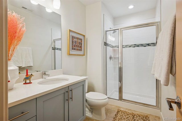 4958 Valentia Ct, Denver, CO 80238 - bathroom with vanity, toilet, a shower stall, tile patterned floors, and recessed lighting