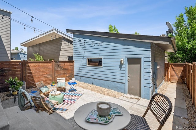 4958 Valentia Ct, Denver, CO 80238 - fenced backyard featuring a patio area