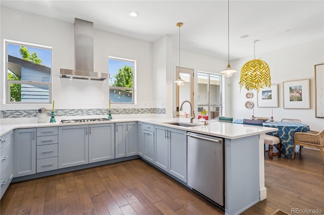 4958 Valentia Ct, Denver, CO 80238 - kitchen with stainless steel dishwasher, wall chimney range hood, gray cabinetry, healthy amount of natural light, and recessed lighting