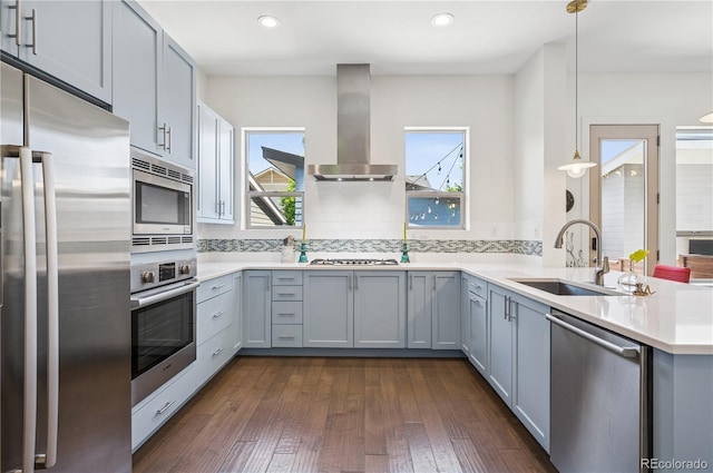 4958 Valentia Ct, Denver, CO 80238 - kitchen featuring stainless steel appliances, exhaust hood, backsplash, light countertops, and recessed lighting