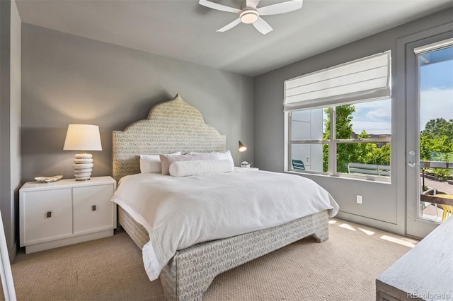 4958 Valentia Ct, Denver, CO 80238 - carpeted bedroom with multiple windows, access to exterior, and a ceiling fan
