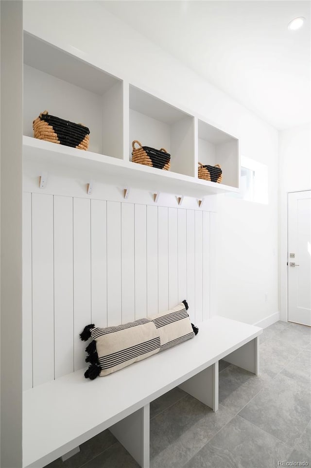 mudroom with light tile flooring